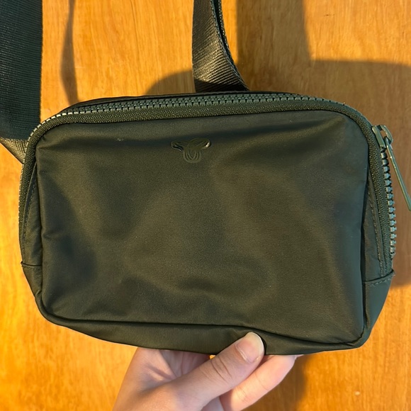 Aritzia Handbags - Aritzia TnAction One the way exposed bag Green